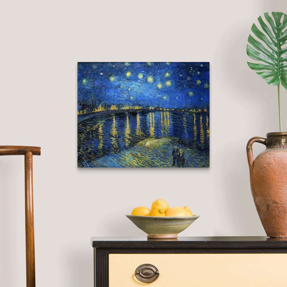 A traditional room featuring Vincent van Gogh's Starry Night Over the Rhone (1888) famous landscape painting.