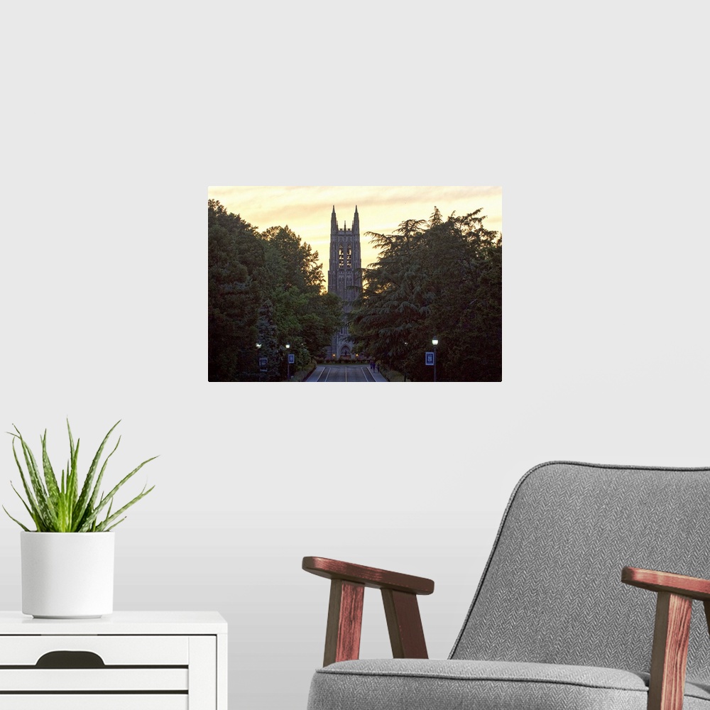A modern room featuring Road leading to the silhouetted steeple of Duke Chapel, Duke University, Durham, North Carolina.