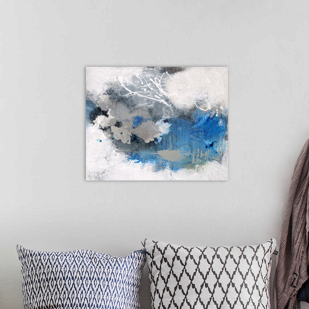 A bohemian room featuring Contemporary abstract painting in white and blue, with white swirls.