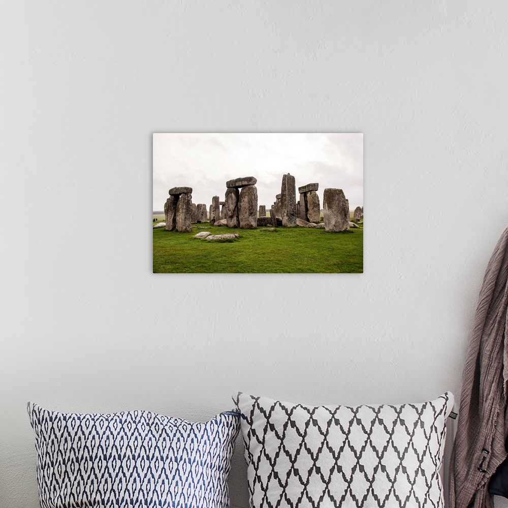 A bohemian room featuring Photograph of Stonehenge, a prehistoric monument and now a historic landmark in Wiltshire, Englan...