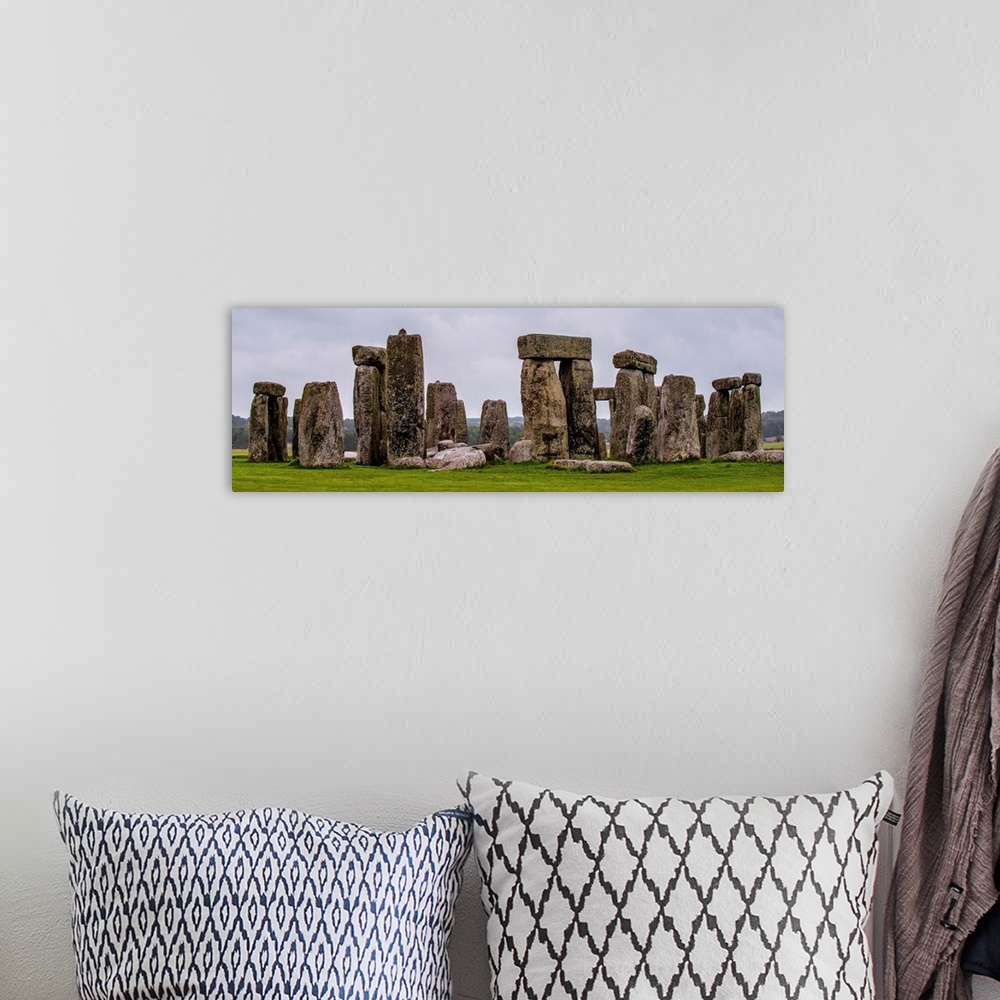 A bohemian room featuring Panoramic photograph of Stonehenge, a prehistoric monument and now a historic landmark in Wiltshi...