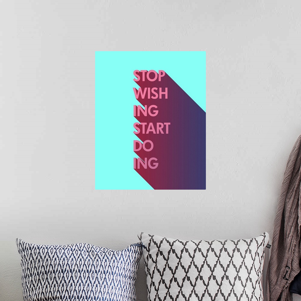 A bohemian room featuring Typography poster with a long gradient drop shadow over pale blue.