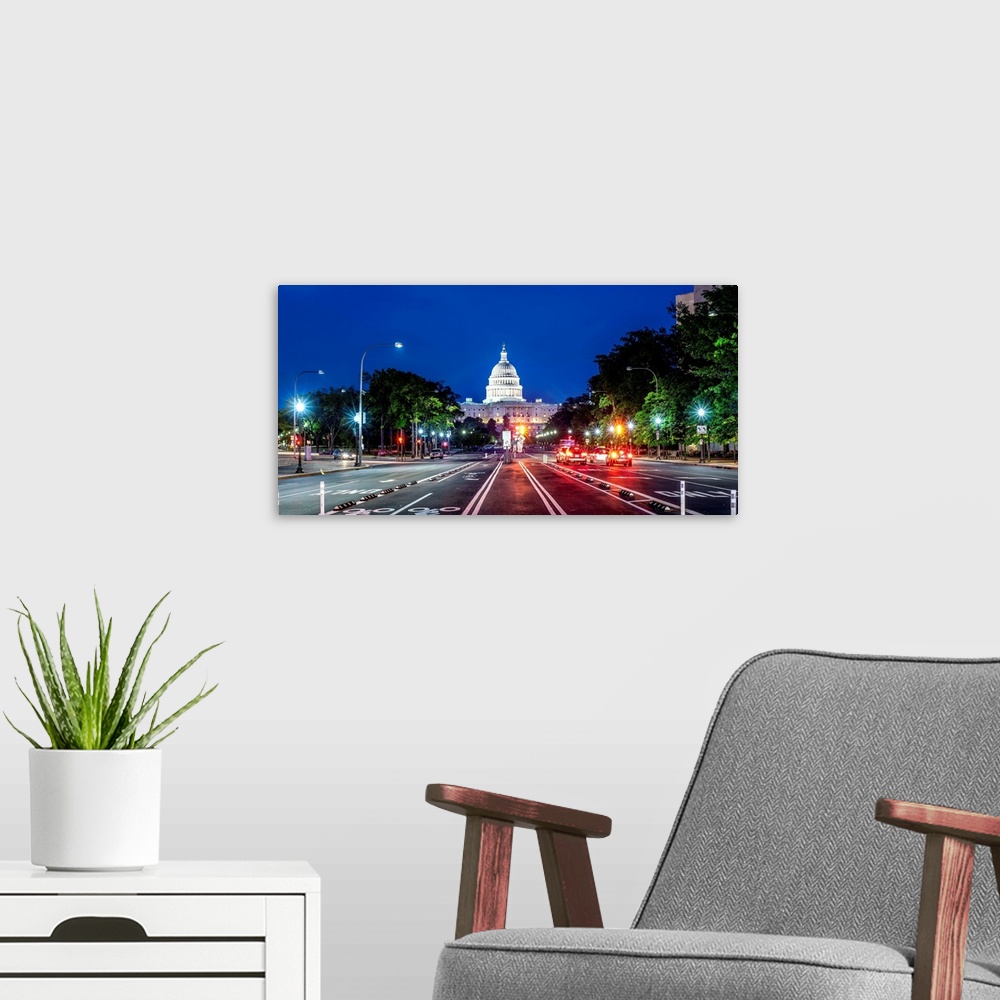 A modern room featuring Streetview of the US Capitol Building at night in Washington DC.