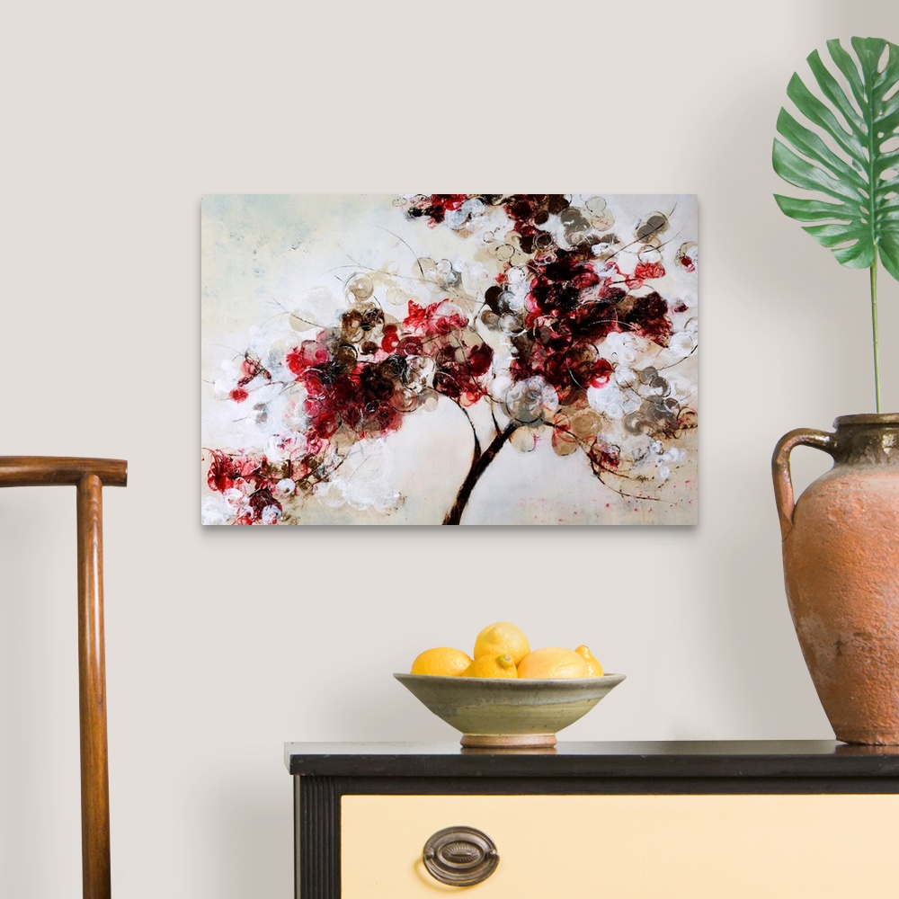 A traditional room featuring Contemporary art of a single tree branch filled with multicolored circular flowers, on a light ne...