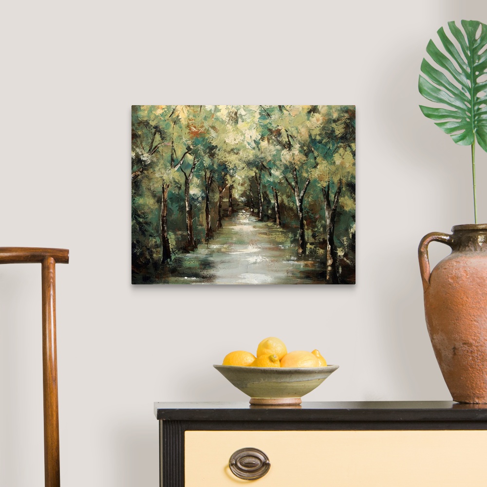 A traditional room featuring Contemporary landscapes scene of a path running through a vibrant and verdant forest.