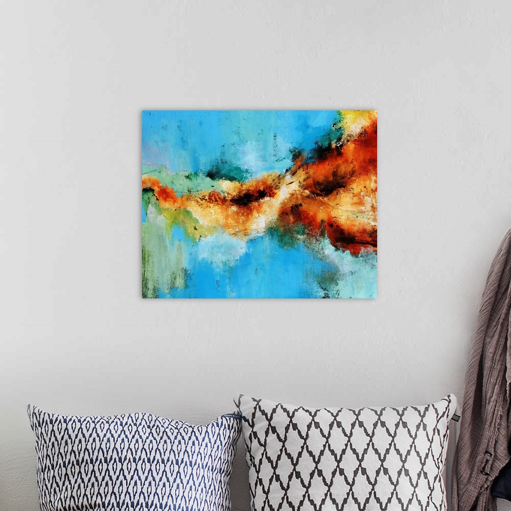 A bohemian room featuring Large abstract painting with warm colors splattered against cool tones.