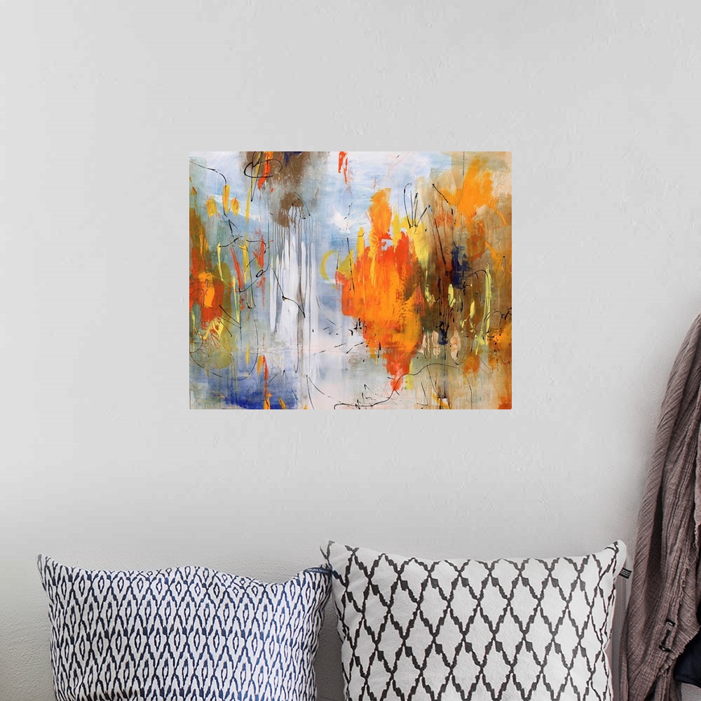 A bohemian room featuring Abstract painting of bright colors mixed with earth tones to create depth.