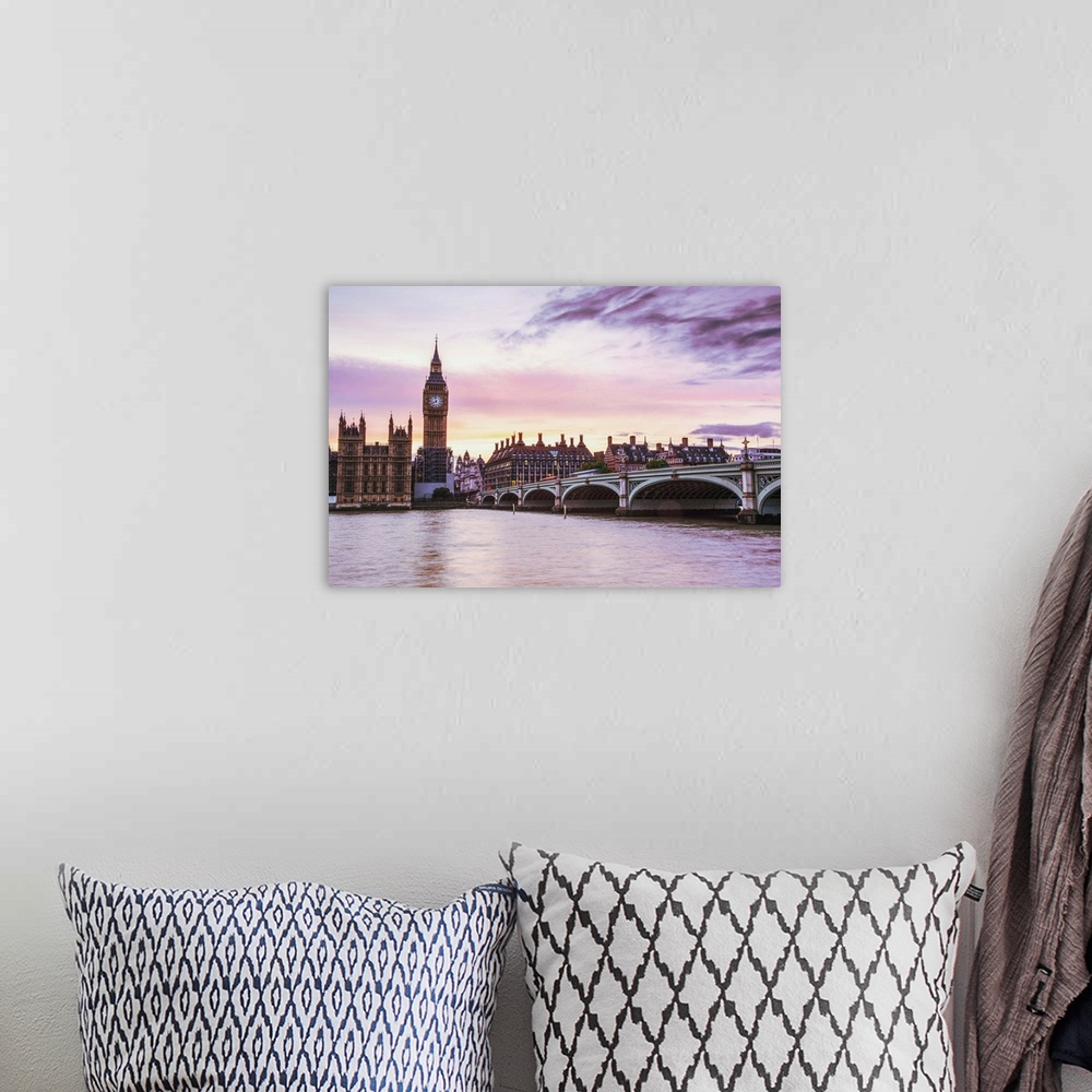 A bohemian room featuring Photograph of Big Ben and the Westminster Bridge with a pink and purple sunset.