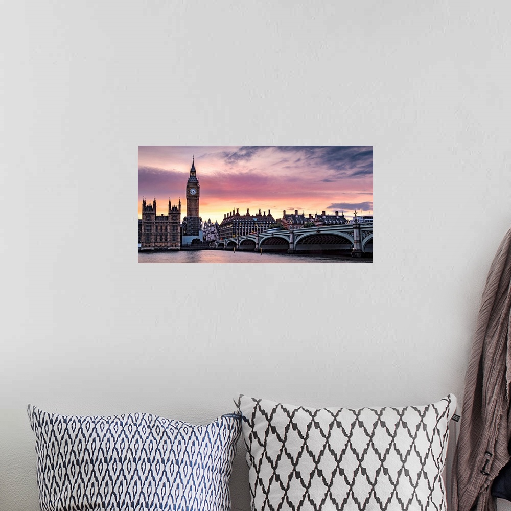 A bohemian room featuring Panoramic photograph of Big Ben and the Westminster Bridge with a pink and purple sunset.