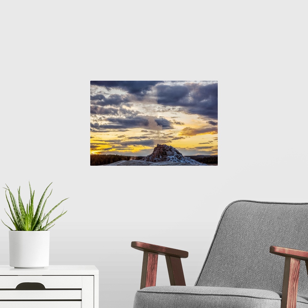A modern room featuring The sun rising at Yellowstone National Park.
