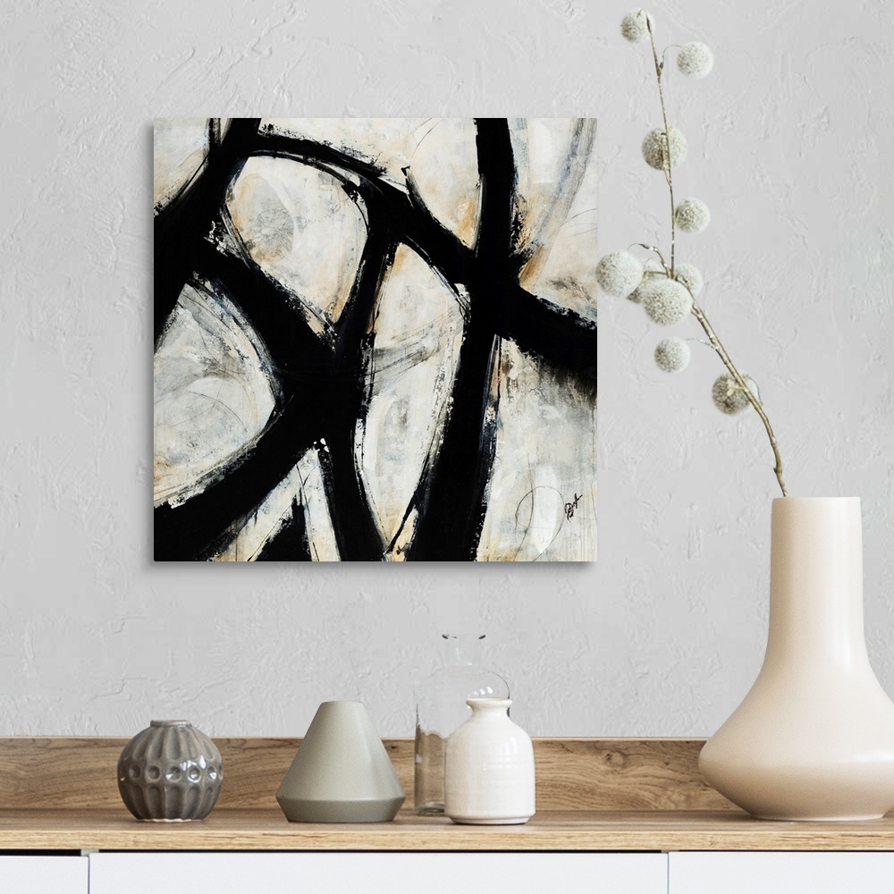 A farmhouse room featuring Contemporary abstract painting of black brush strokes over a netural background.