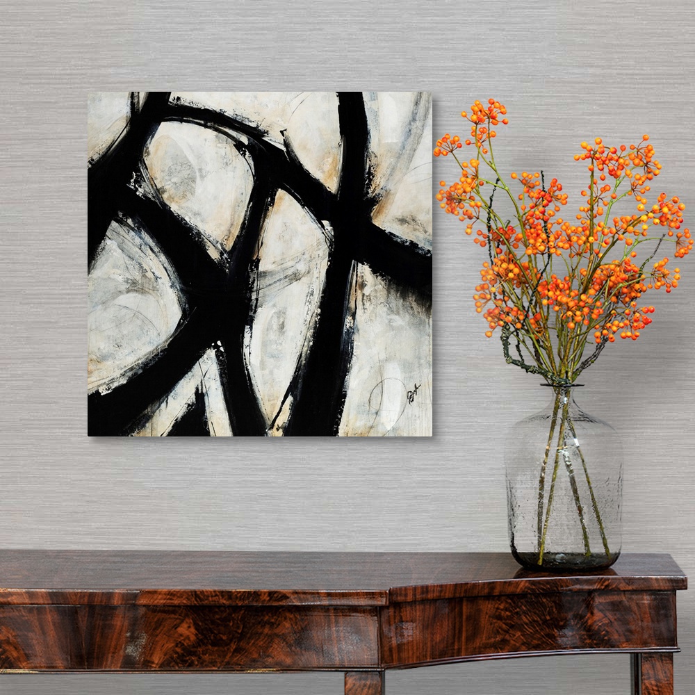 A traditional room featuring Contemporary abstract painting of black brush strokes over a netural background.
