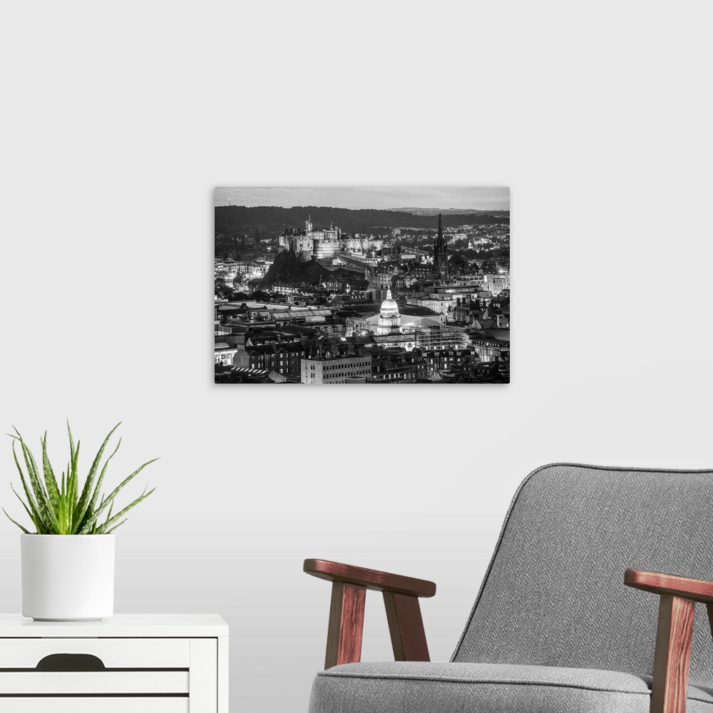 A modern room featuring Black and white aerial photograph of the city of Edinburgh with the Edinburgh Castle standing out.