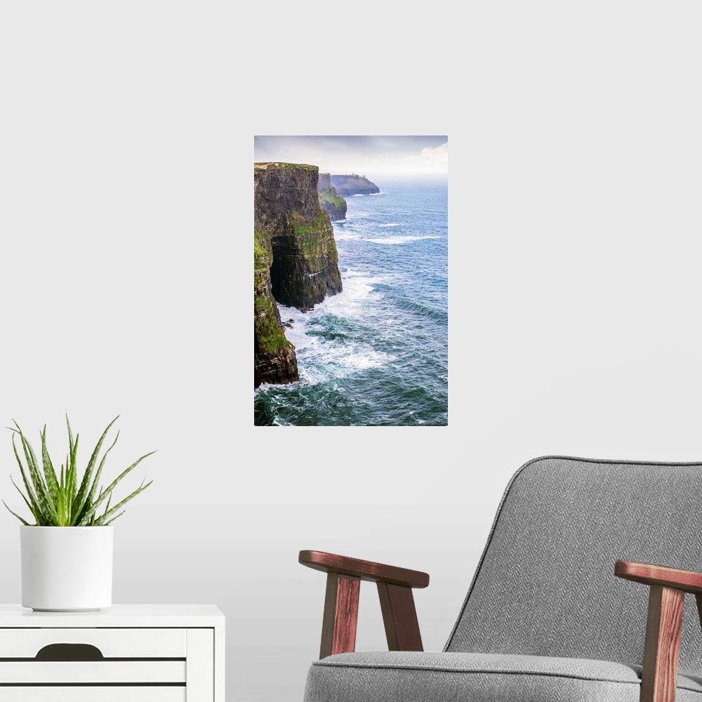 A modern room featuring Landscape photograph of the picturesque Cliffs of Moher, located at the southwestern edge of the ...