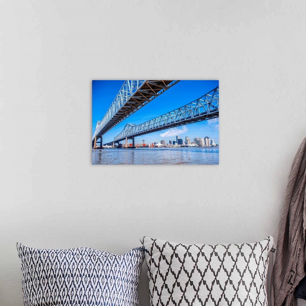 A bohemian room featuring Photograph of the Crescent City Connection, formerly the Greater New Orleans Bridge, twin cantile...