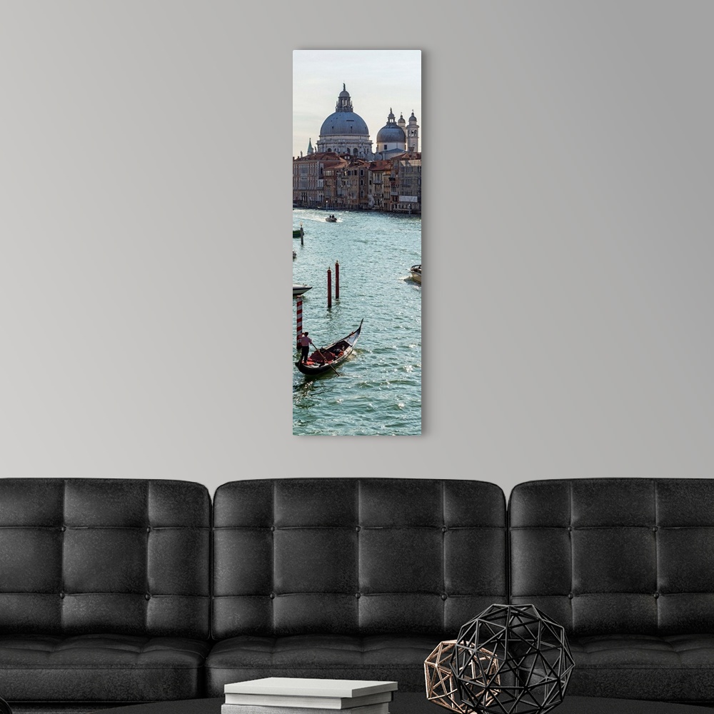 A modern room featuring Panoramic photograph of gondolas and boats on the Grand Canal with Santa Maria della Salute in th...