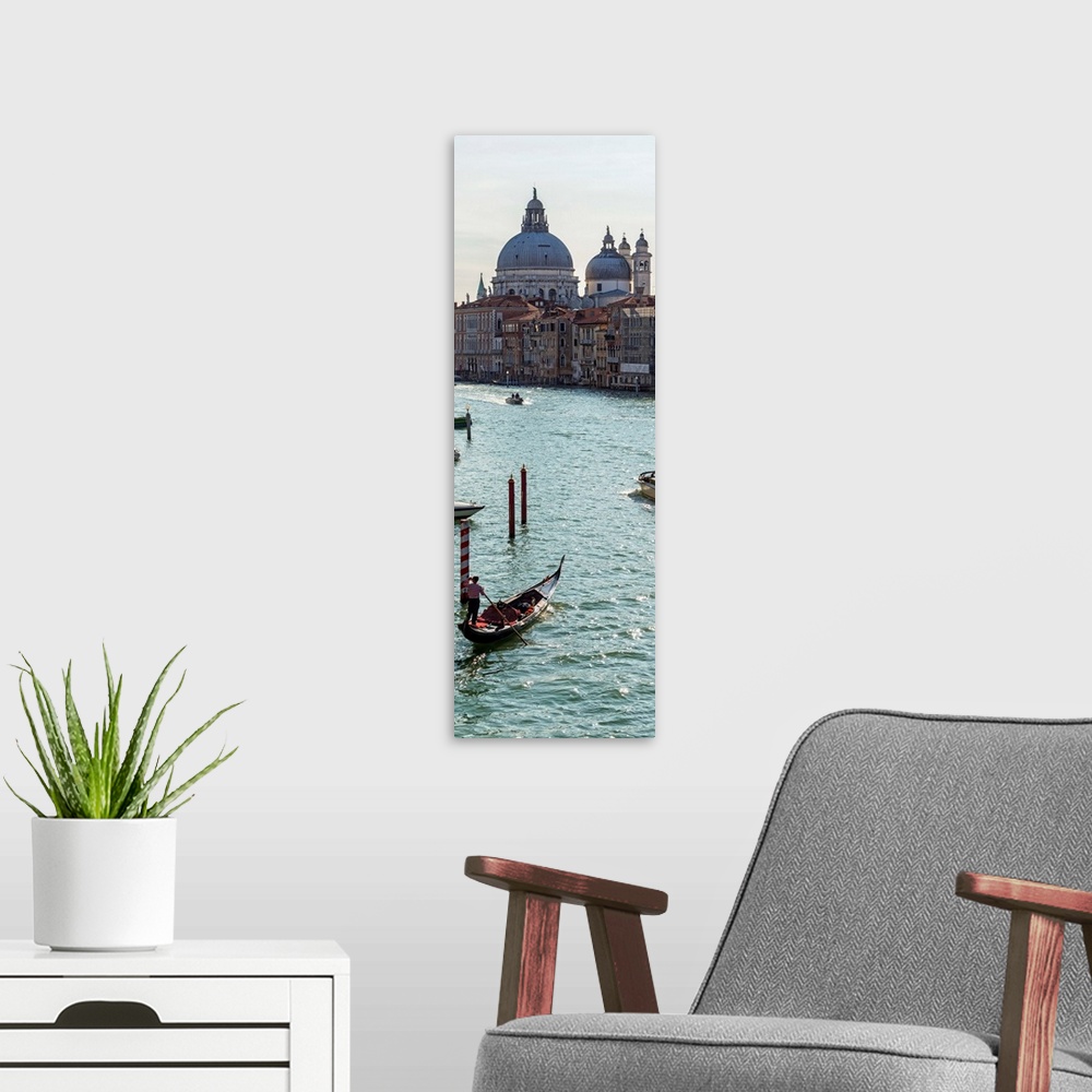 A modern room featuring Panoramic photograph of gondolas and boats on the Grand Canal with Santa Maria della Salute in th...