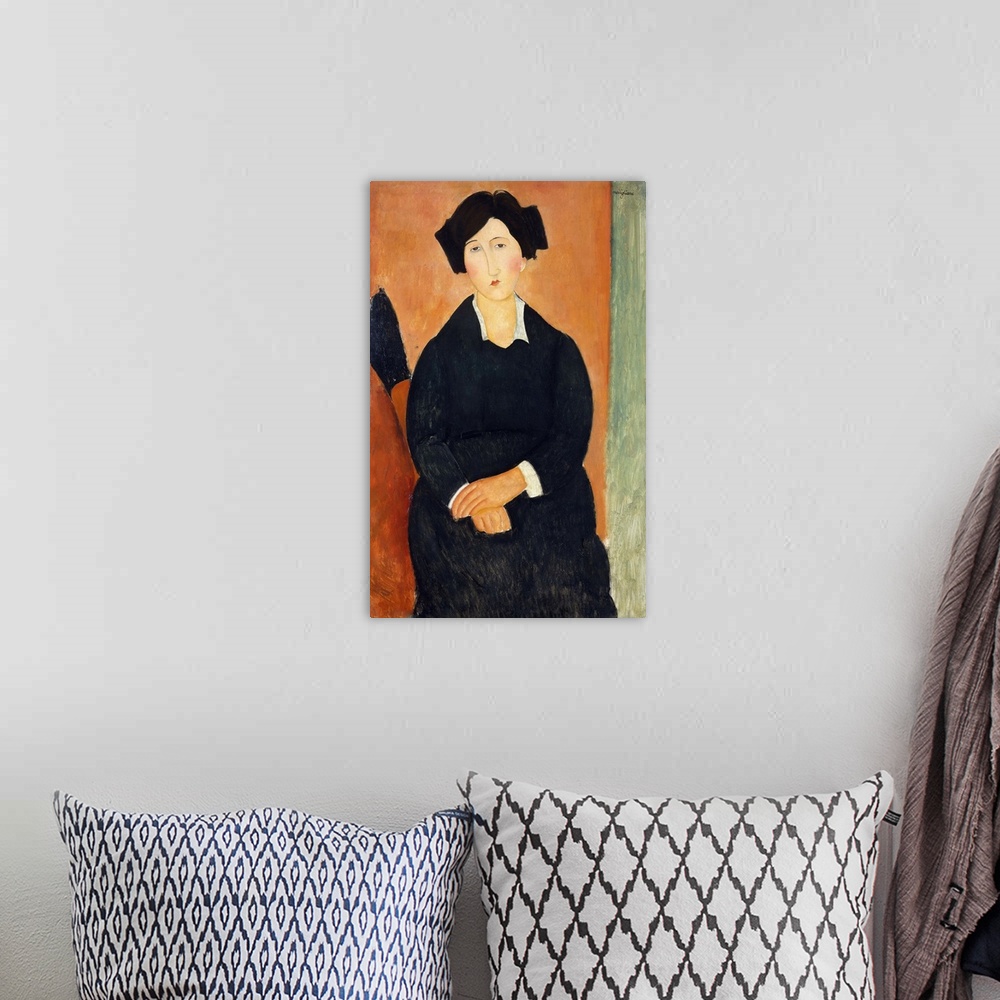 A bohemian room featuring The identity of the patient-looking sitter is unknown. Modigliani might have chosen her because s...