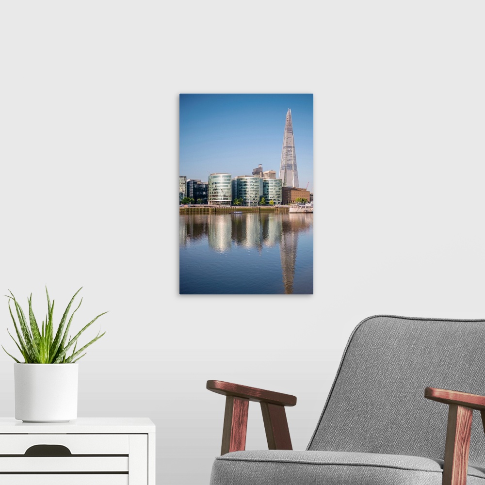 A modern room featuring The Shard Skyscraper in London, England.