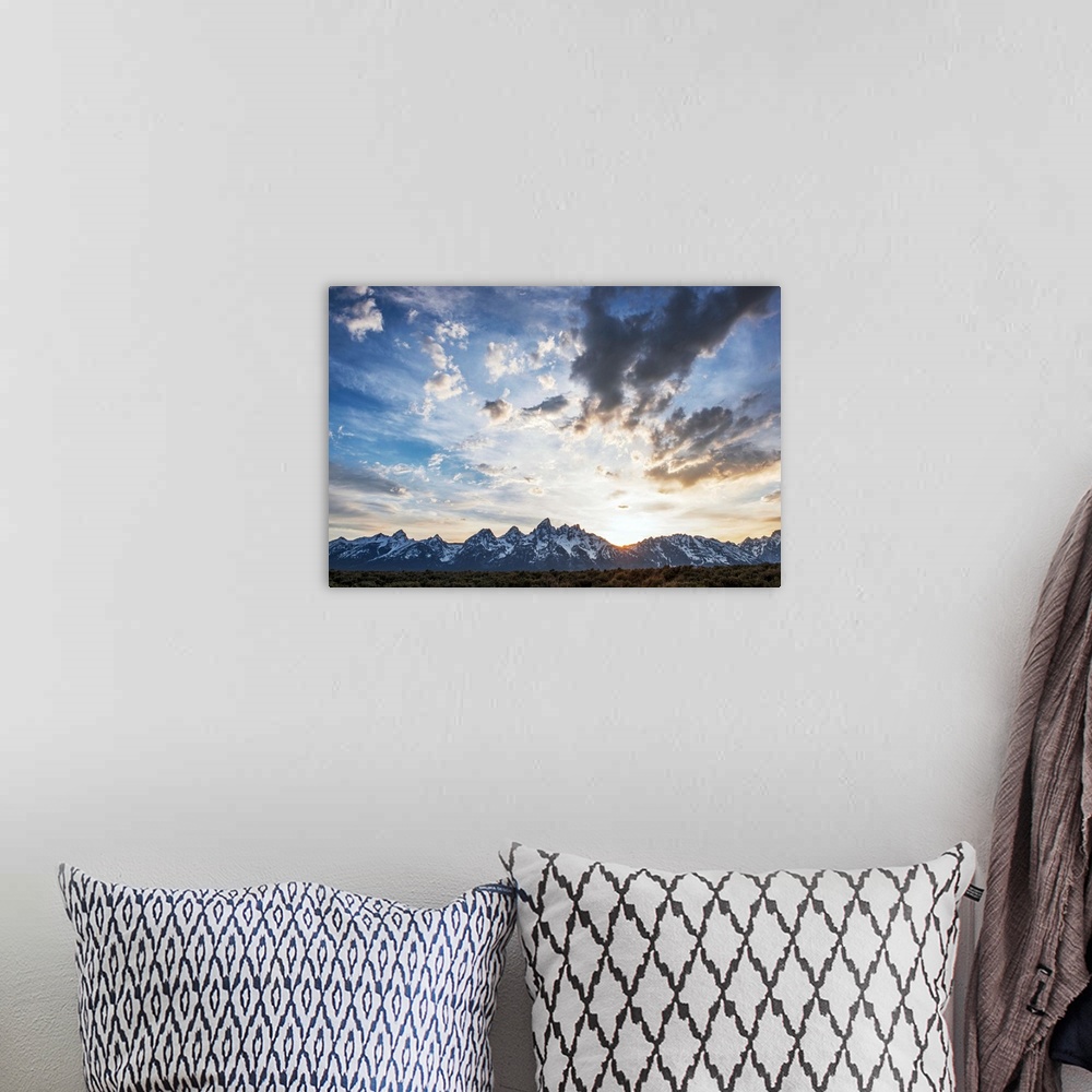 A bohemian room featuring View of clouds over Teton mountains in the morning in Wyoming.