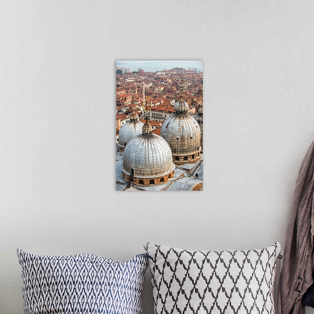 A bohemian room featuring Aerial view of three domes of San Marco Basilica with Venice rooftops in the background.