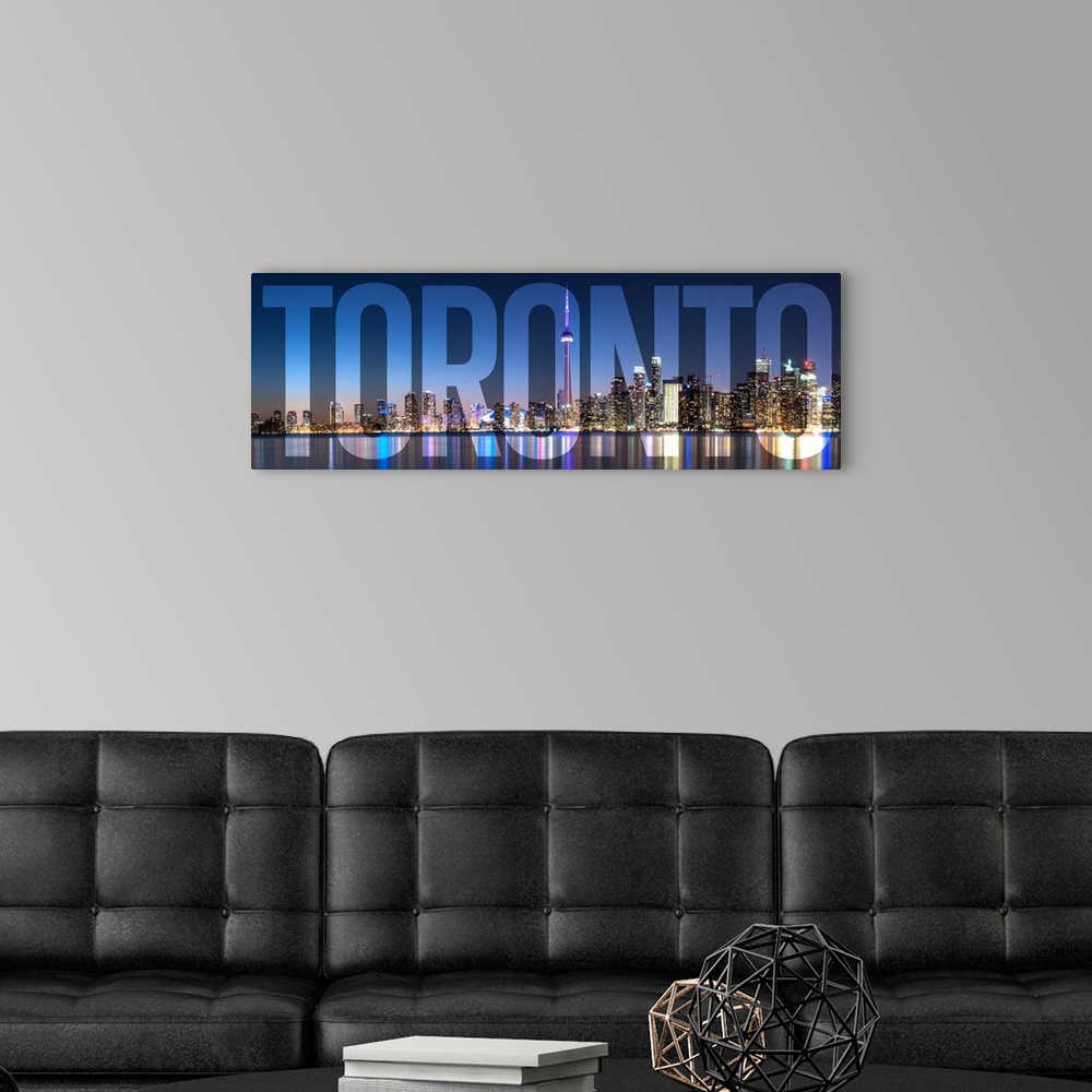 A modern room featuring Transparent typography art overlay against a photograph of the Toronto city skyline.