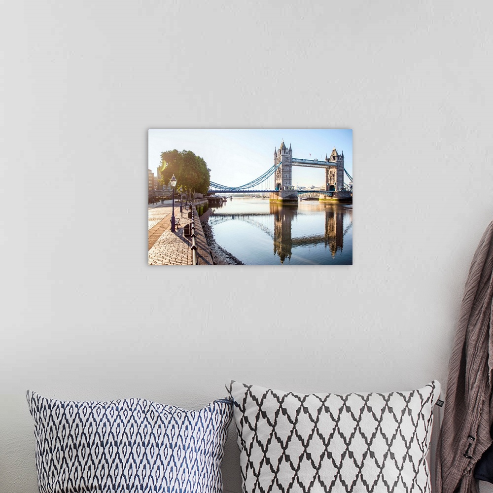 A bohemian room featuring Photograph of Tower Bridge  reflecting on River Thames with a brick sidewalk on the side.