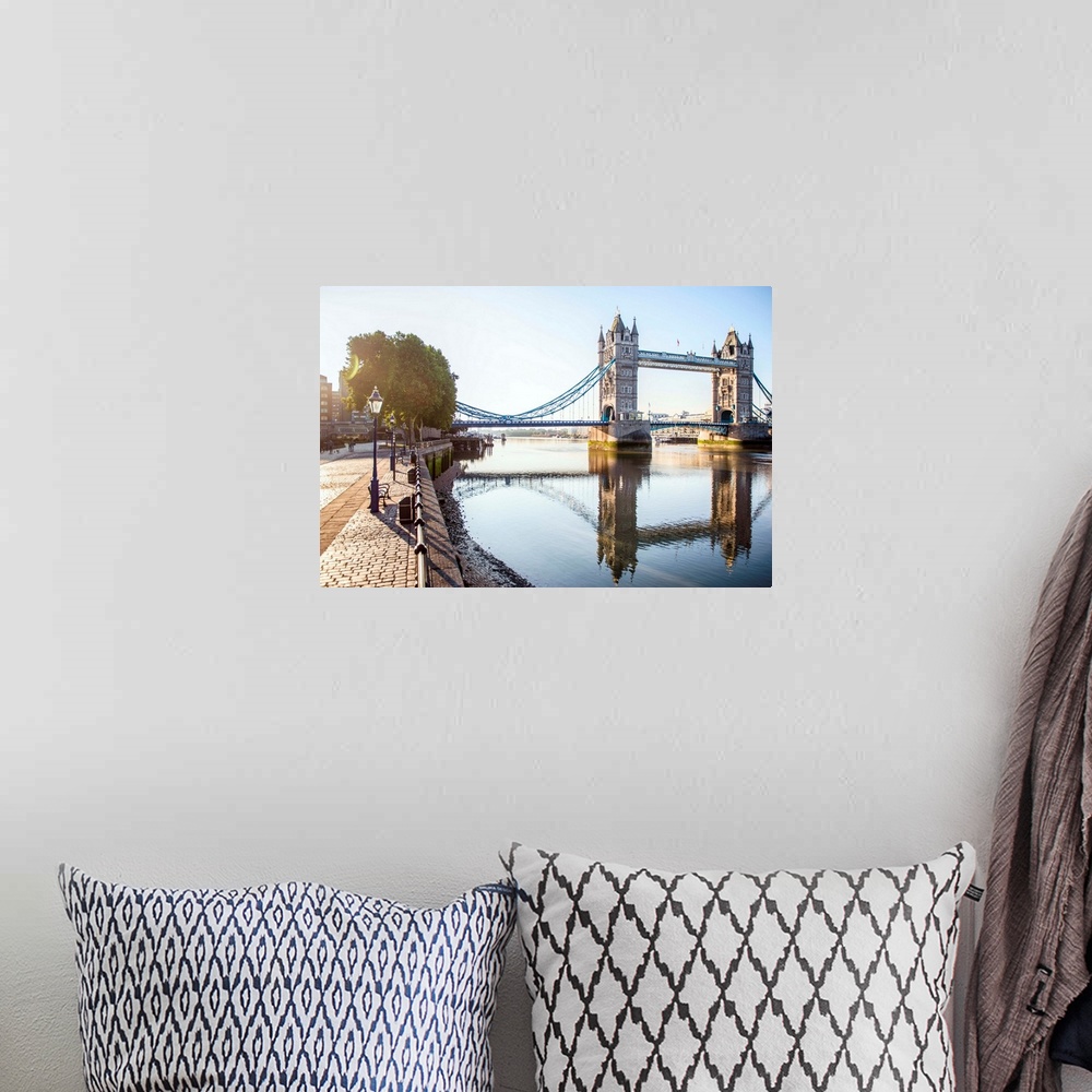A bohemian room featuring Photograph of Tower Bridge  reflecting on River Thames with a brick sidewalk on the side.