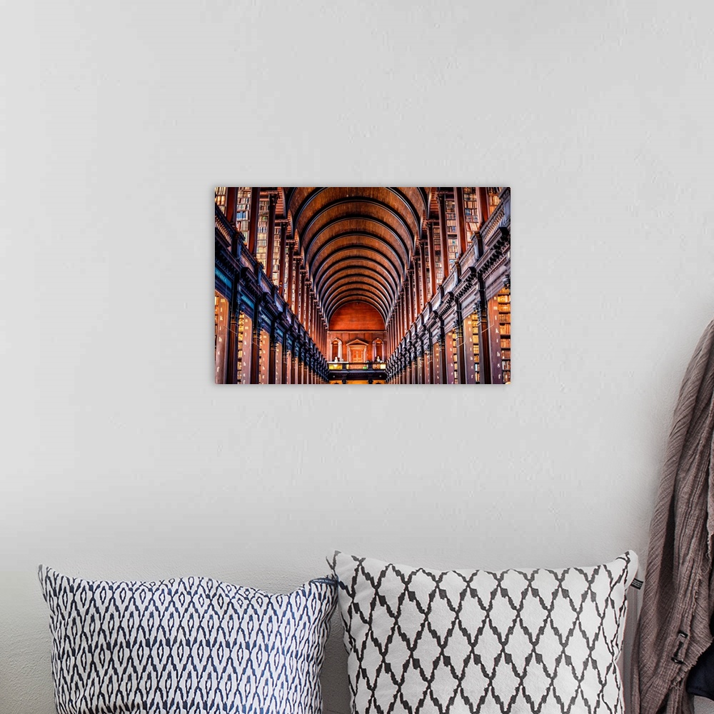 A bohemian room featuring Photograph of the arched wooden ceilings of Trinity College Library, which serves Trinity College...