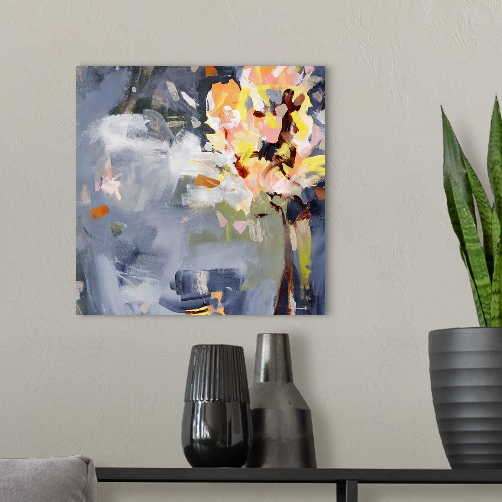 A modern room featuring Square abstract painting of florals over an indigo background.