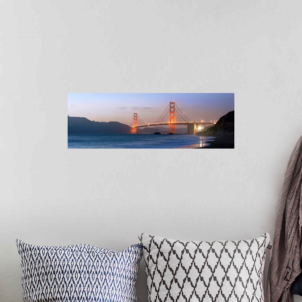 A bohemian room featuring Panoramic photograph at twilight of the Golden Gate Bridge taken from the shore.