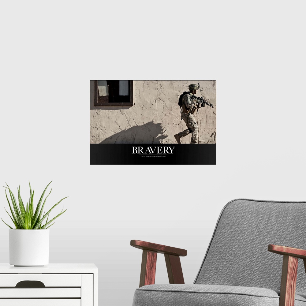 A modern room featuring A soldier is photographed walking in front of a concrete wall with his weapon up and the word "Br...
