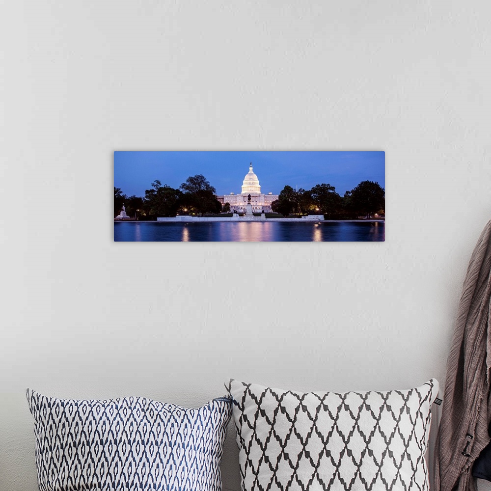 A bohemian room featuring Panoramic photograph of the U.S. Capitol Building at dusk with blue and magenta hues from the Cap...