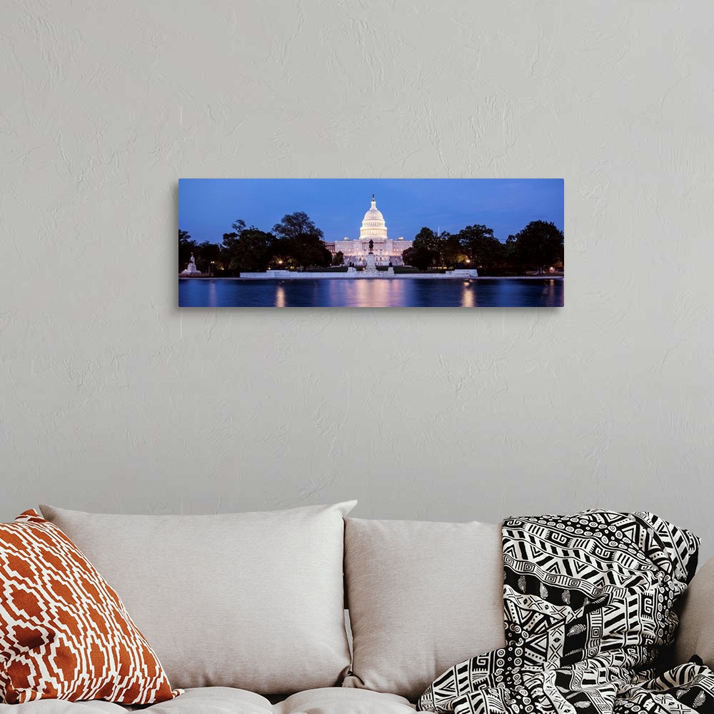 A bohemian room featuring Panoramic photograph of the U.S. Capitol Building at dusk with blue and magenta hues from the Cap...