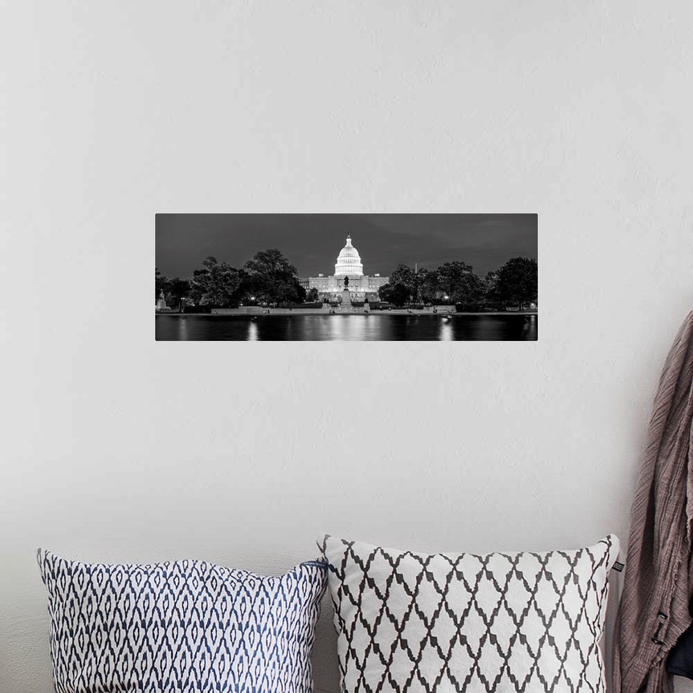 A bohemian room featuring Panoramic photograph of the U.S. Capitol Building at dusk with the Capitol Reflecting Pool.