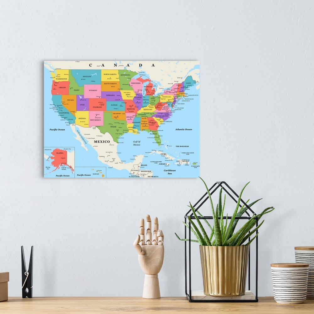 A bohemian room featuring Large color map of the United States of America with a classic font.