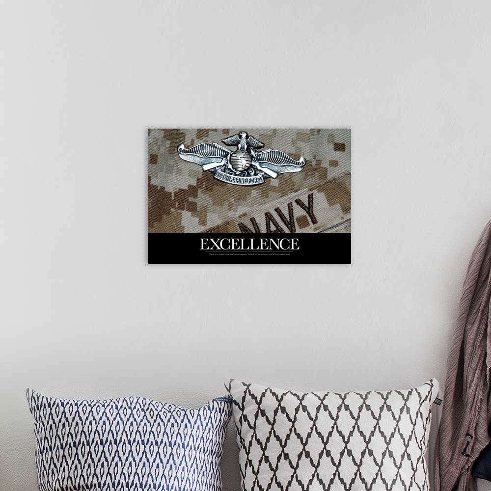 A bohemian room featuring Inspirational message about excellence underneath a close up of a Navy military uniform and a sil...