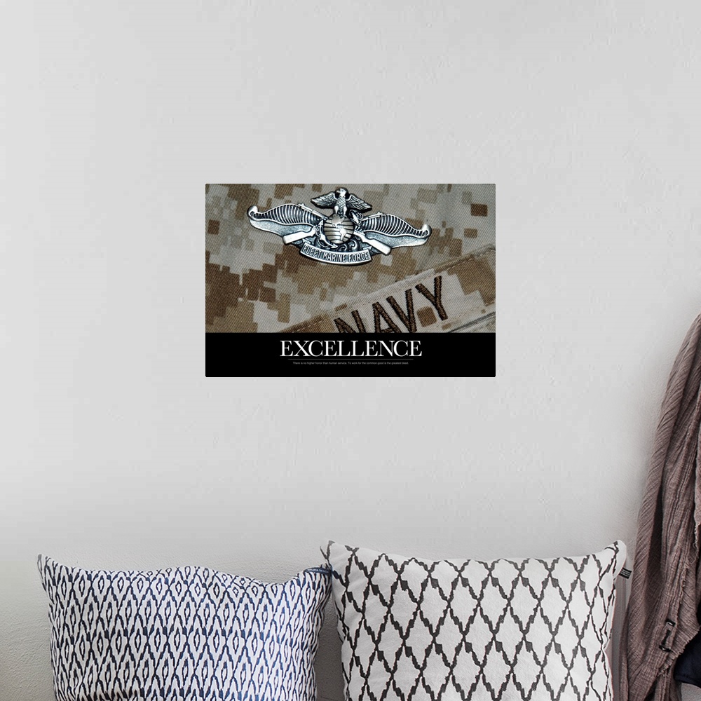 A bohemian room featuring Inspirational message about excellence underneath a close up of a Navy military uniform and a sil...