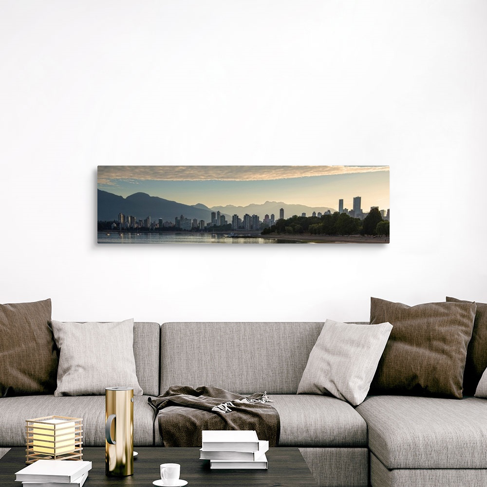 A traditional room featuring Panoramic photograph of the Vancouver, British Columbia, Canada skyline at sunset with silhouette...