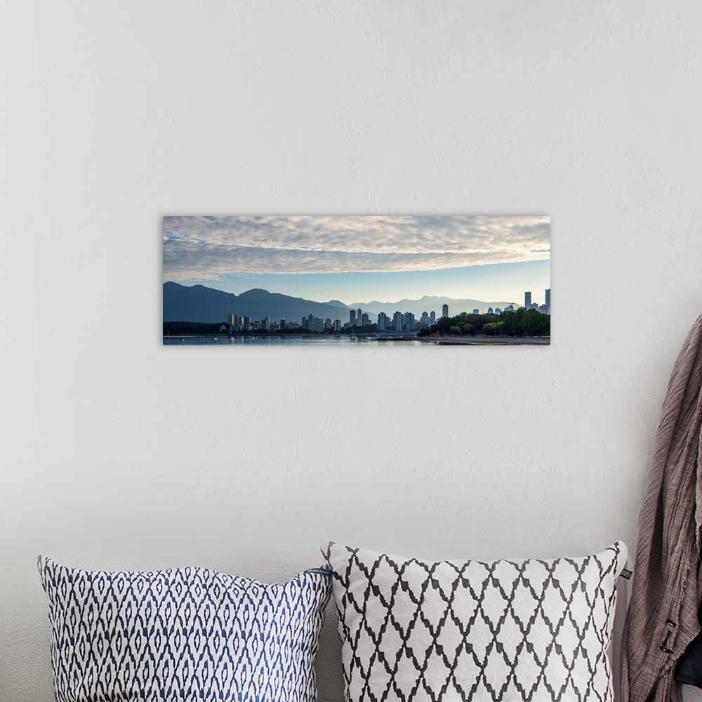 A bohemian room featuring Panoramic photograph of the Vancouver, British Columbia, Canada skyline at sunset with silhouette...