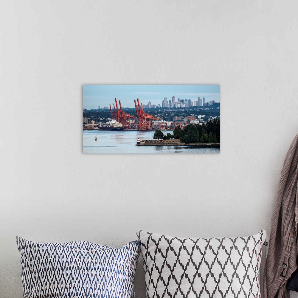 A bohemian room featuring View of Vancouver harbor with Metrotown in the background, Vancouver, British Columbia, Canada.