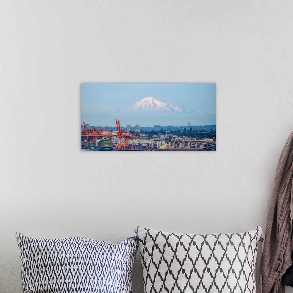 A bohemian room featuring Vancouver harbor with Mount Baker in the background, Vancouver, British Columbia, Canada.