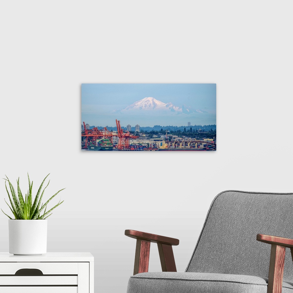 A modern room featuring Vancouver harbor with Mount Baker in the background, Vancouver, British Columbia, Canada.