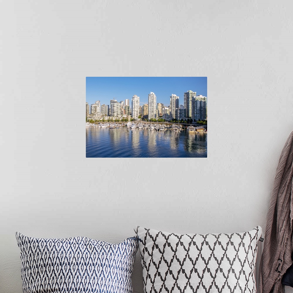A bohemian room featuring Photograph of part of the Vancouver, British Columbia skyline with False Creek Harbor and boats i...