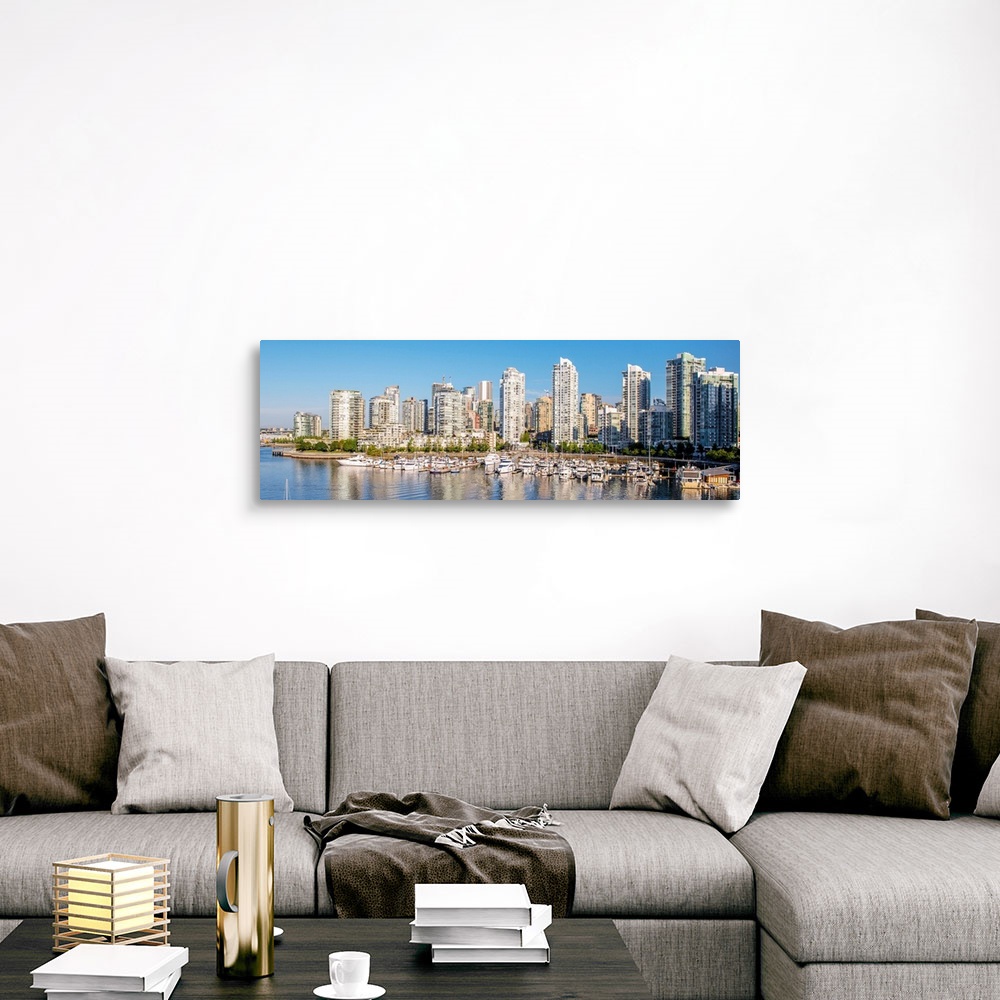 A traditional room featuring Panoramic photograph of part of the Vancouver, British Columbia skyline with False Creek Harbor a...