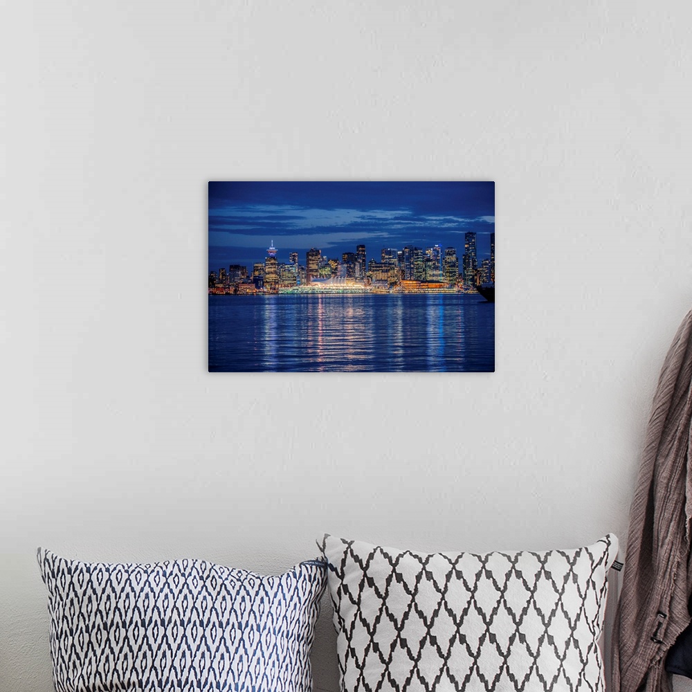 A bohemian room featuring View of Vancouver skyline at night in British Columbia, Canada.