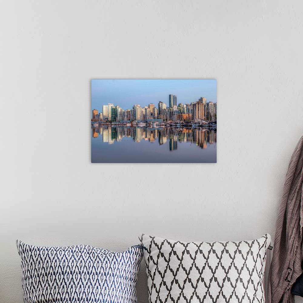 A bohemian room featuring Vancouver skyline with boats in Vancouver, British Columbia, Canada.
