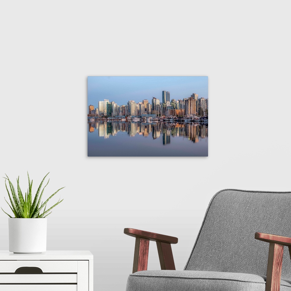A modern room featuring Vancouver skyline with boats in Vancouver, British Columbia, Canada.