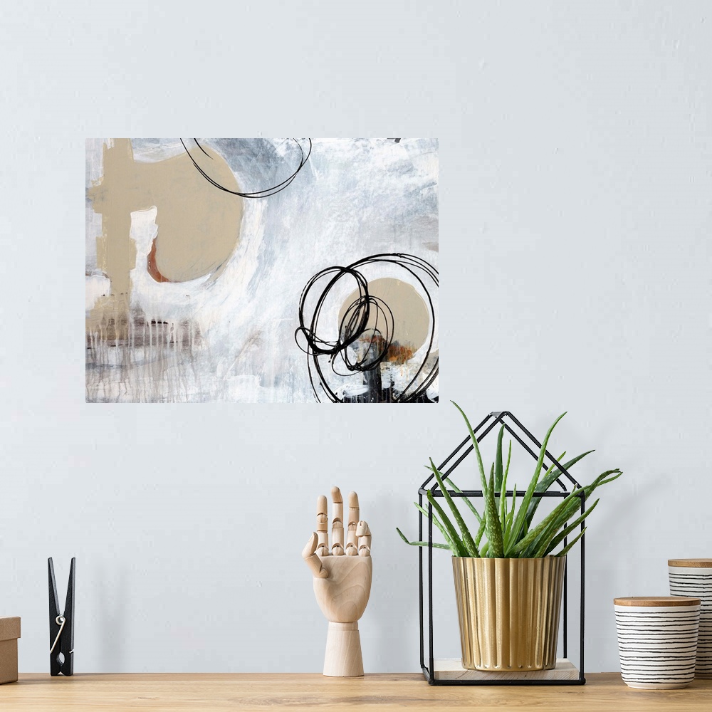 A bohemian room featuring Contemporary abstract painting of dripping paint and scribbled ink circles.
