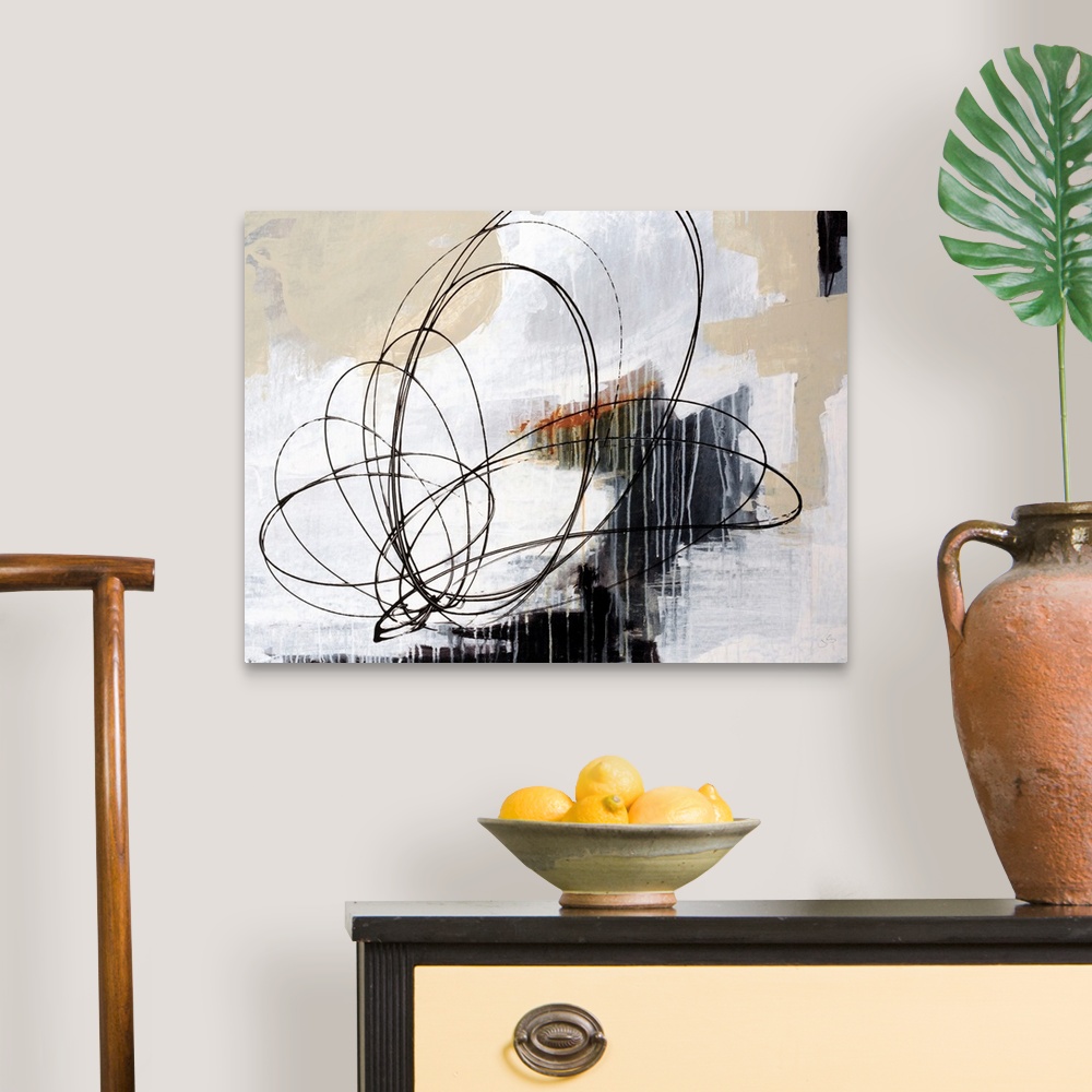 A traditional room featuring Horizontal abstract art work of layered paint textures with rapid, circular shapes drawn in this ...